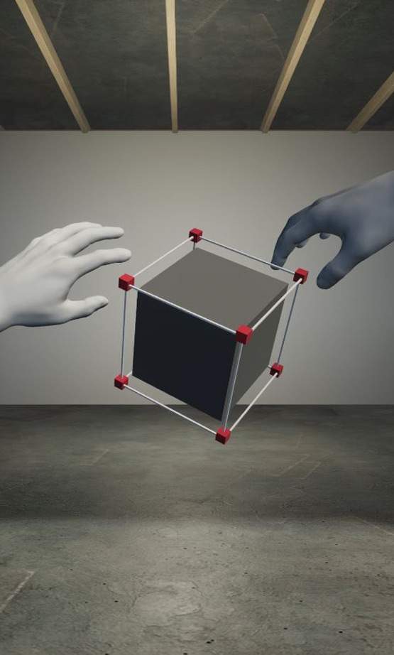 Two trainees represented by different coloured VR hands manipulating the same object in a shared virtual room