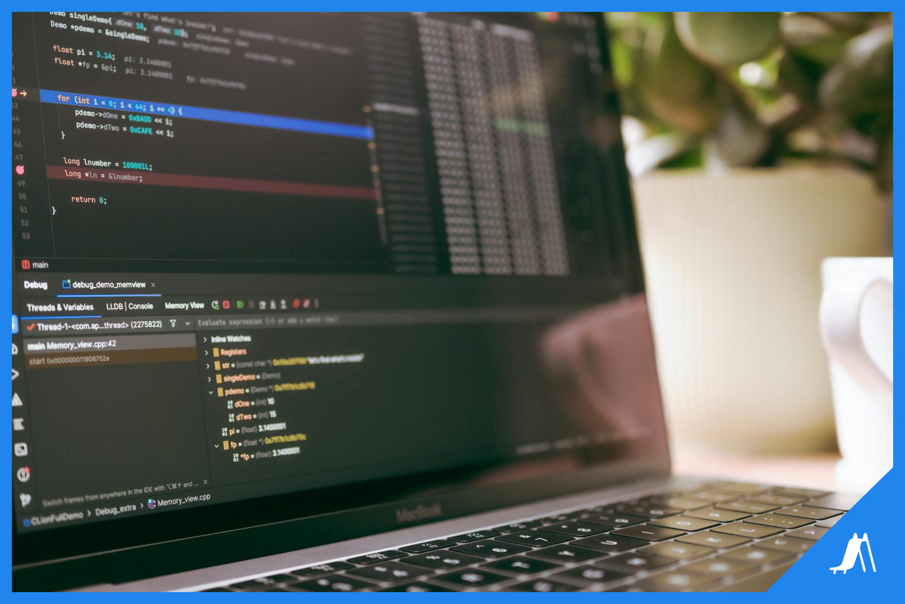 Code editor open on a laptop displaying debugging output and variables